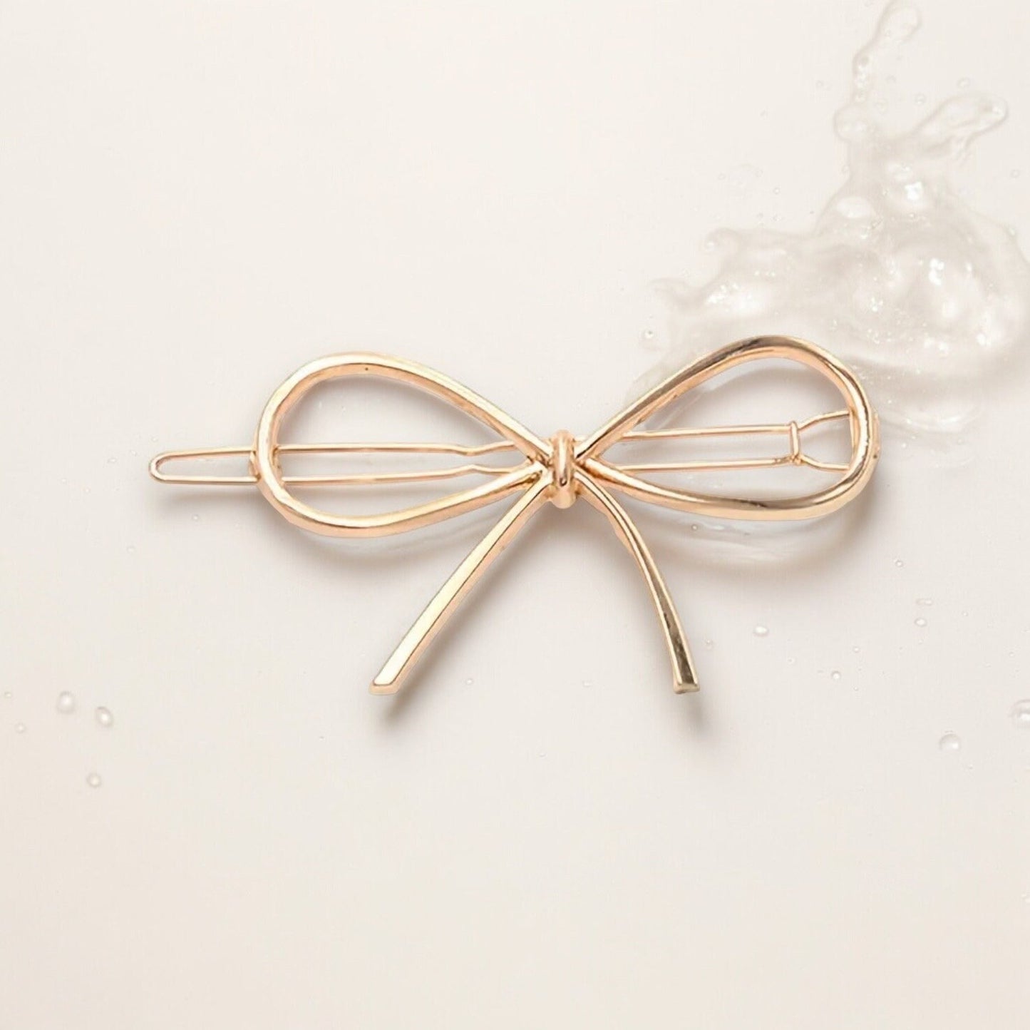 METAL BOW HAIR BARRETTE