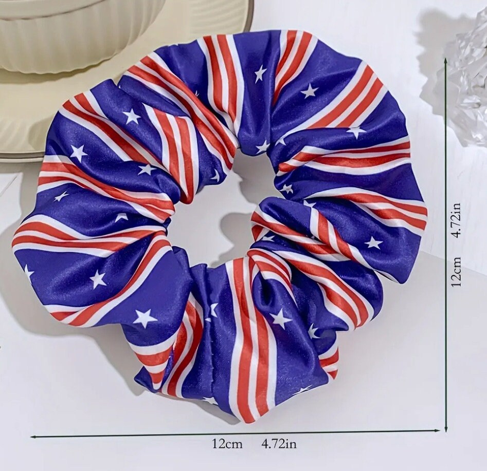 One of the striped scrunchies with measurements reading 12cm/12cm or 4.72inx4.72in