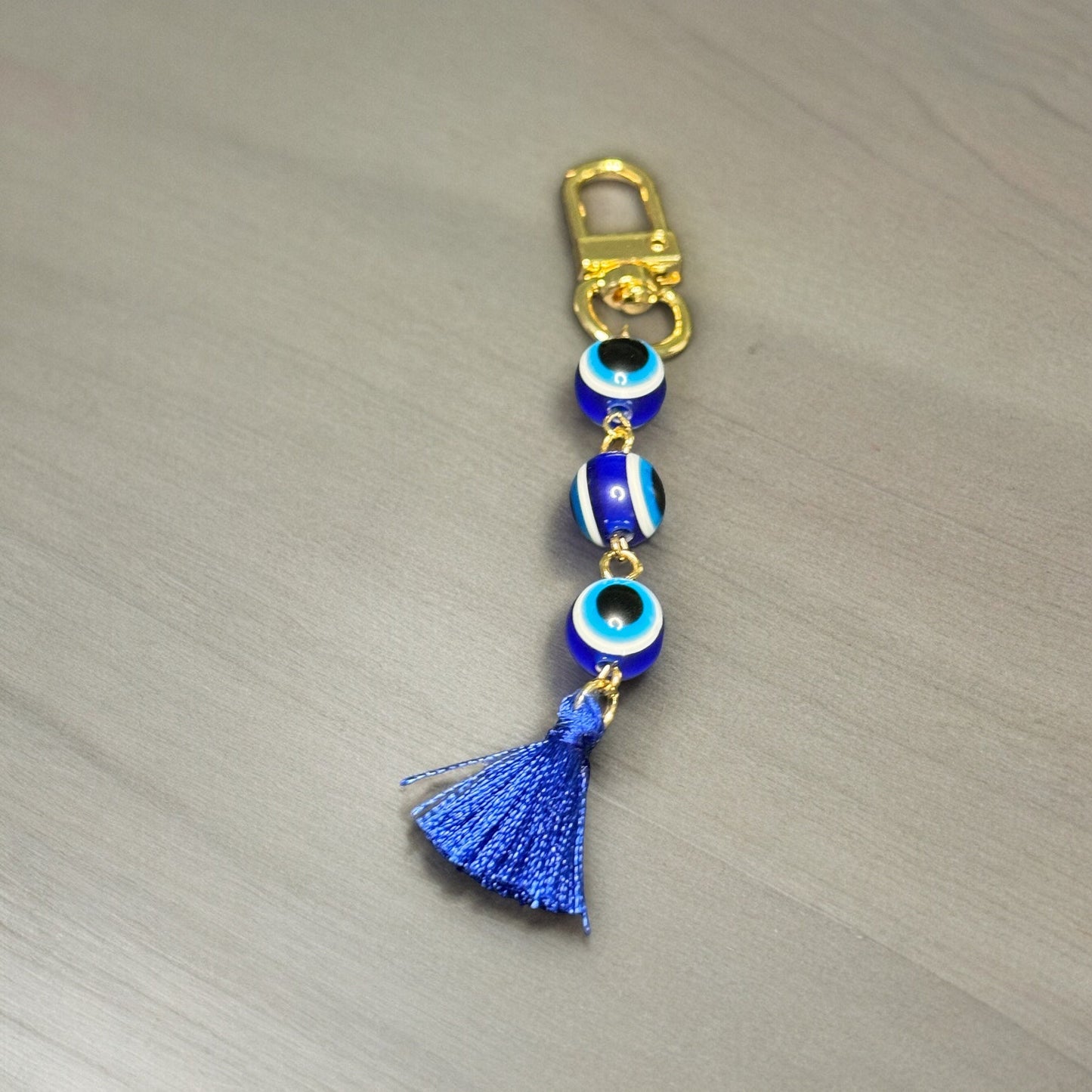 GOLD EVIL EYE BEADED TASSEL KEYCHAIN