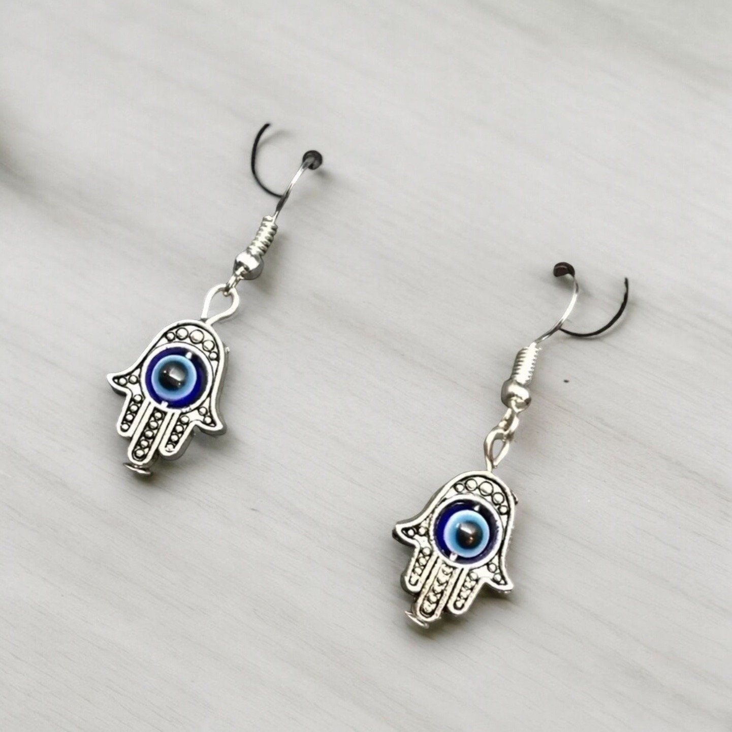 SILVER EVIL EYE HAMSA DANGLE EARRINGS