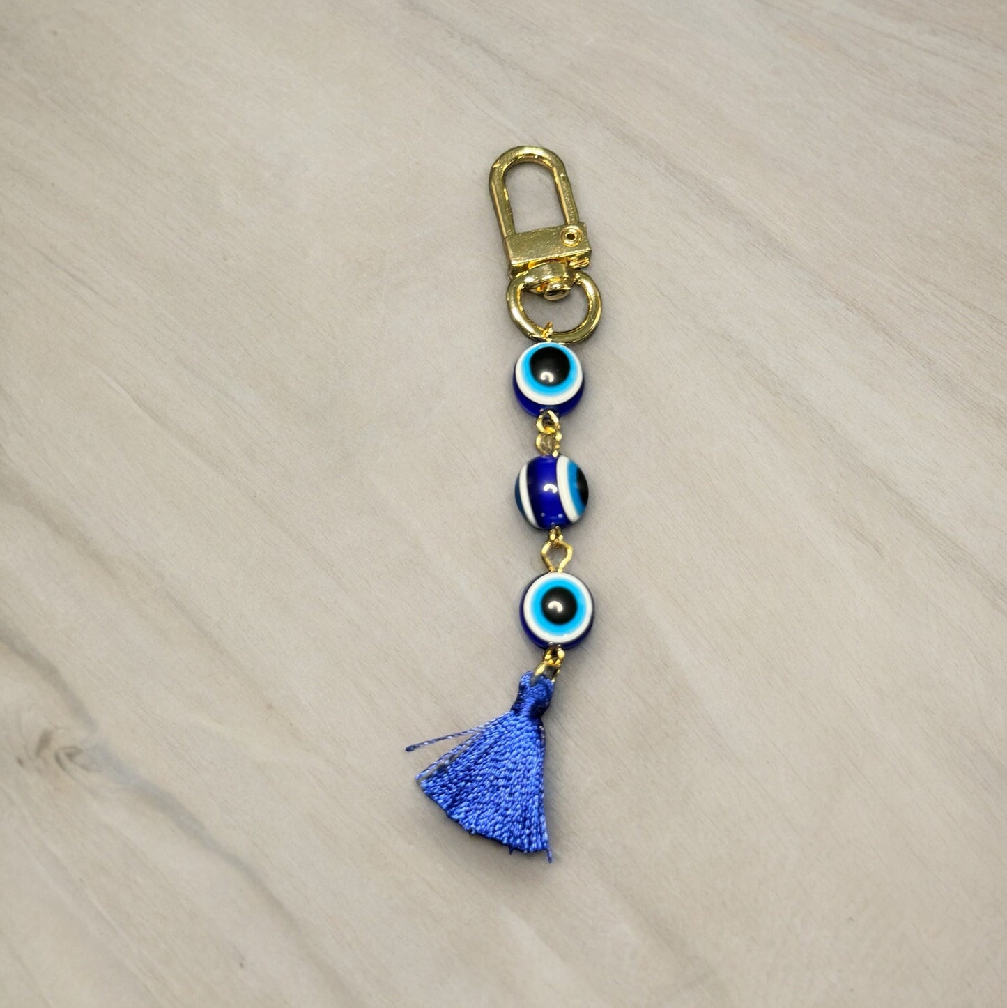 GOLD EVIL EYE BEADED TASSEL KEYCHAIN