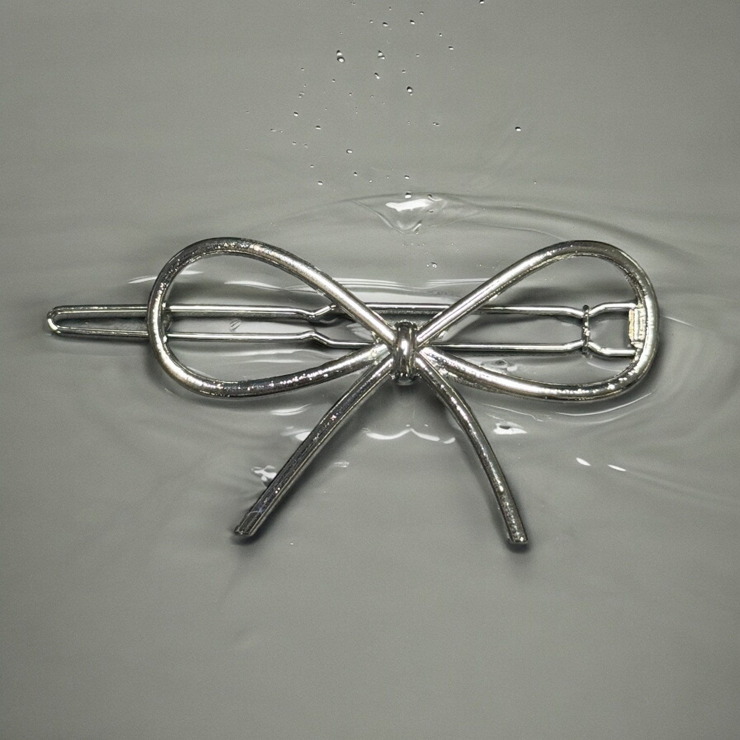 METAL BOW HAIR BARRETTES