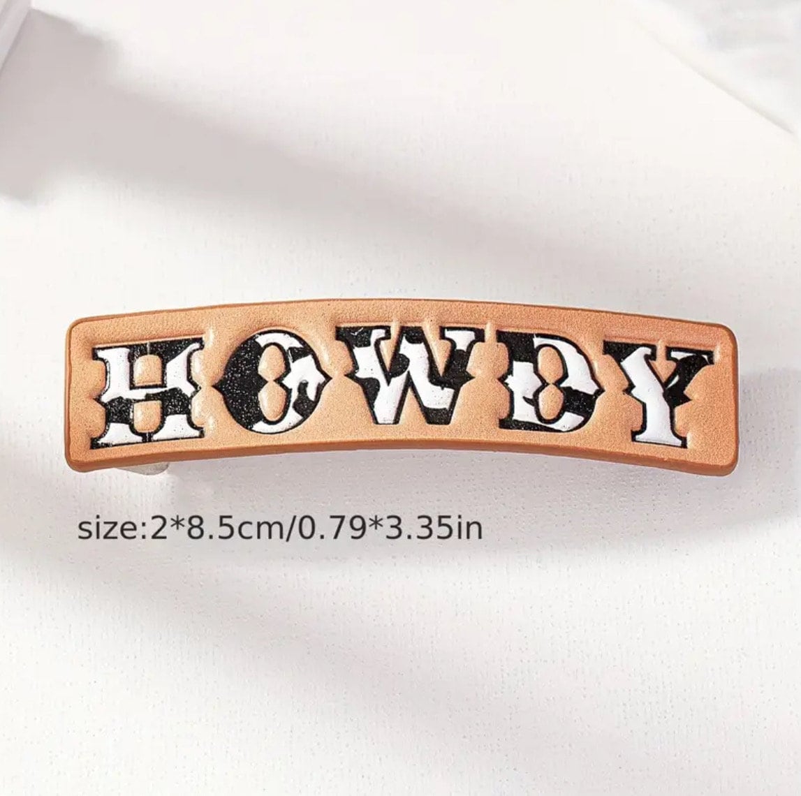 FAUX LEATHER COW PRINT HOWDY BARRETTE